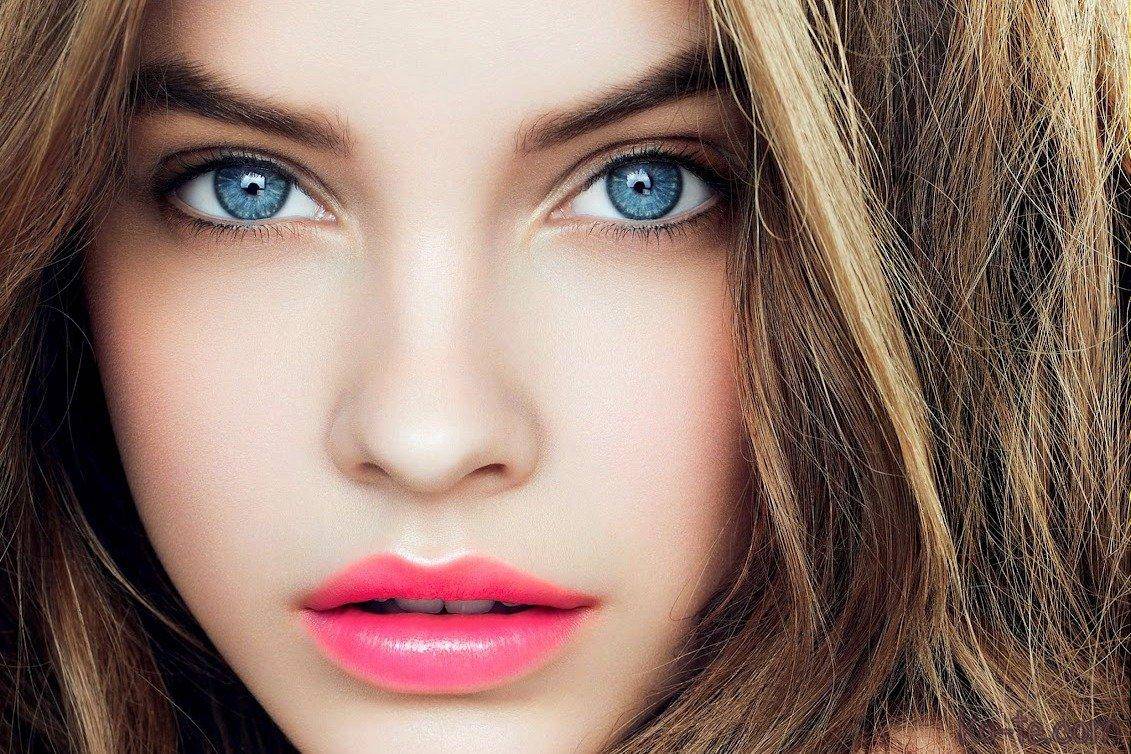 5. "Dark-haired beauty with striking blue eyes" - wide 1