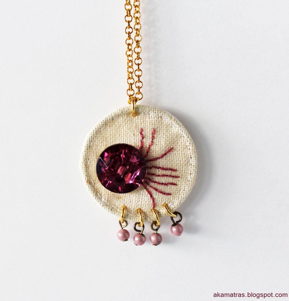 Embroidered pendant