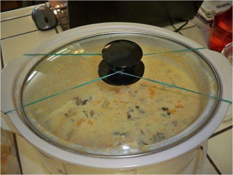 Secure the lid on slow cookers when traveling by using rubber bands