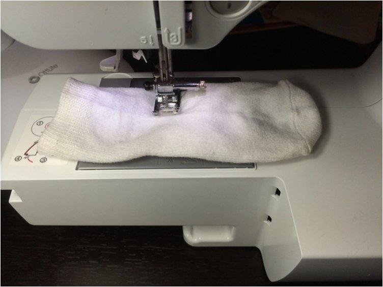 Sew one of your kid s socks closed halfway down.