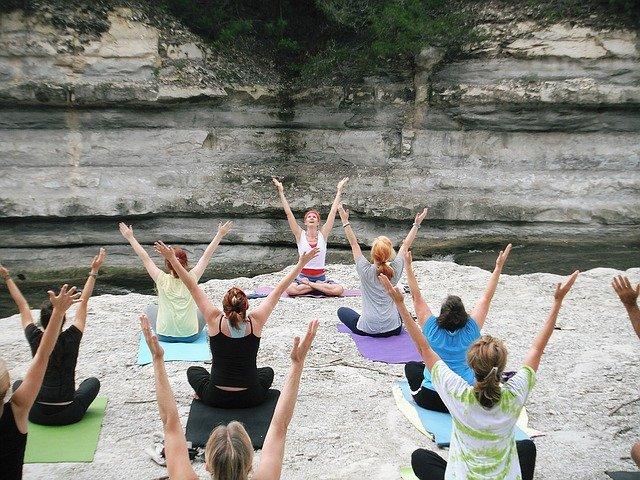 women-giving-yoga-training