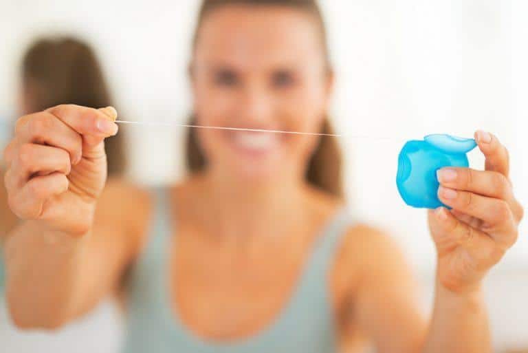 Why You Should Floss Before Brushing Your Teeth