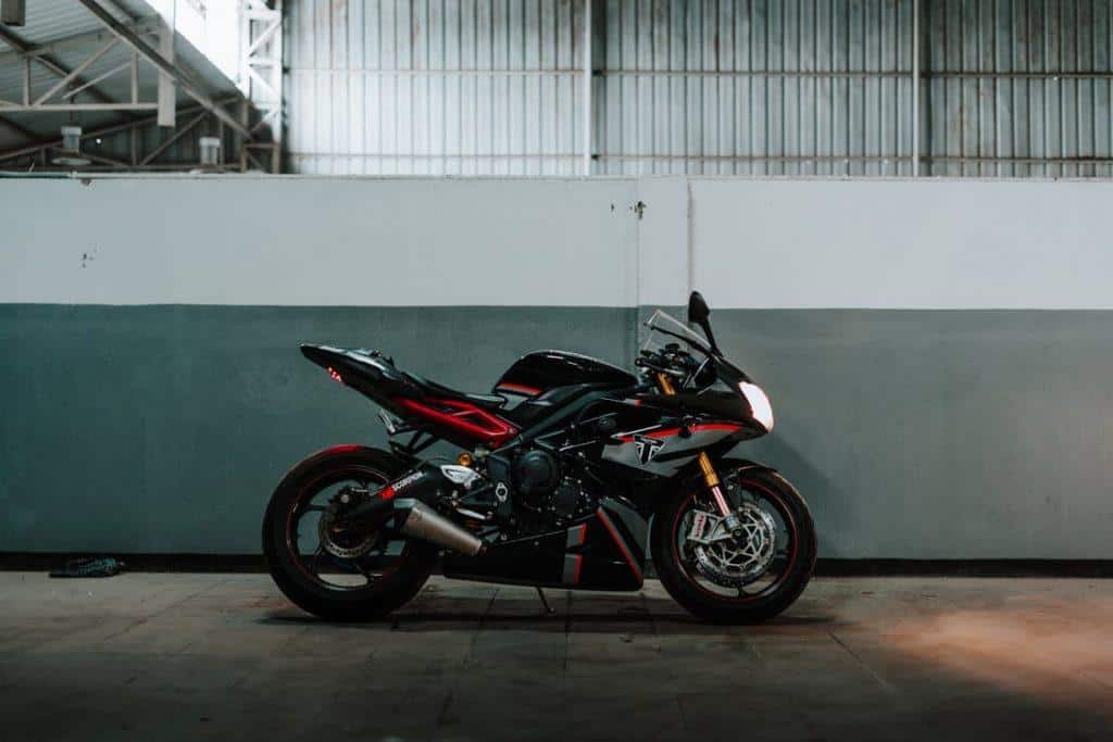 Photo of Parked Black and Red Triumph Daytona Sports Bike
