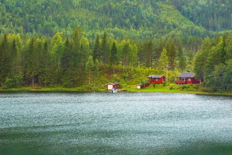 Cottage on shore of fjord in Norwegian style