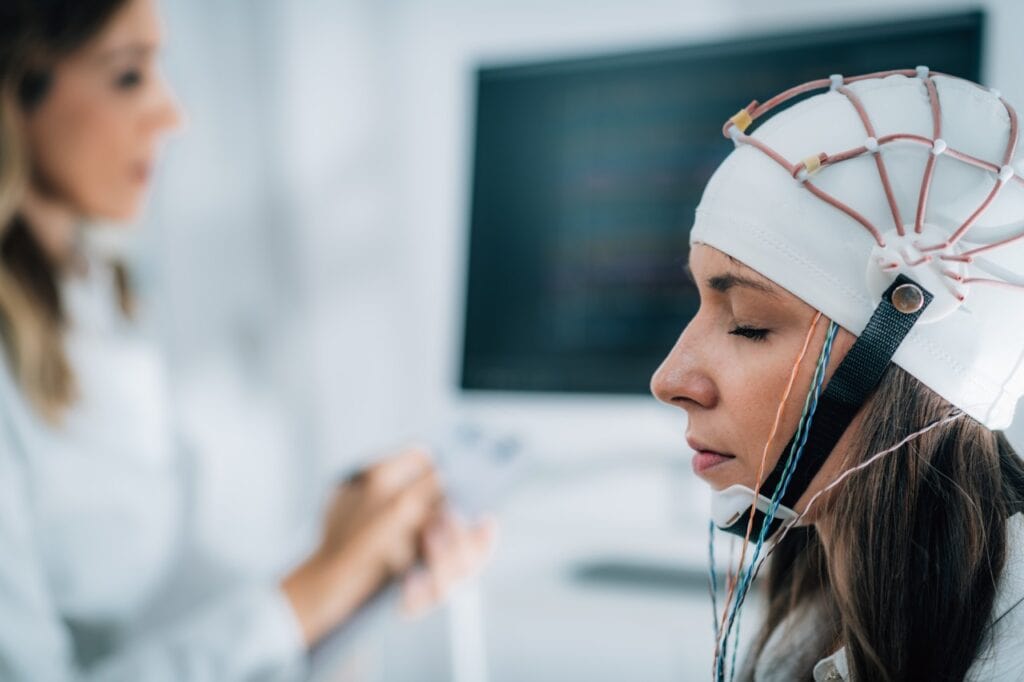 Doctor using automated imaging system in hospital